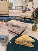 Iced Chai Latte and Herbivore Breakfast Sandwich